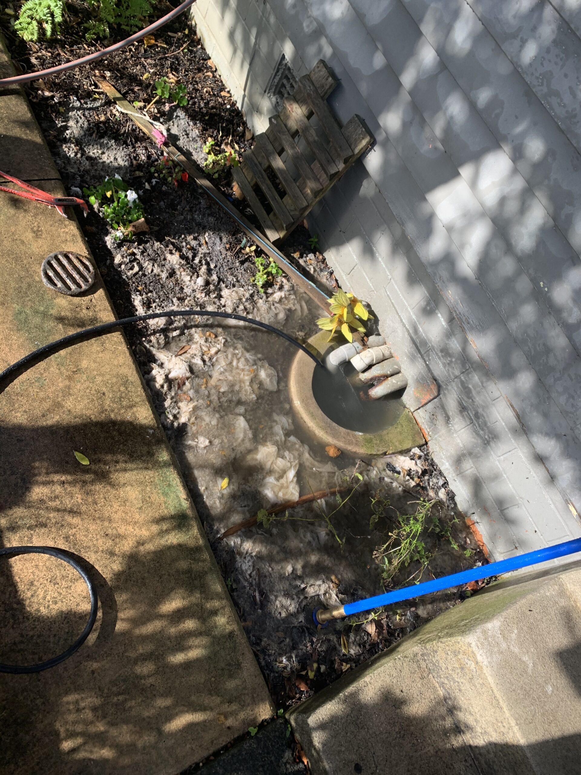 Blocked drain being cleared with via hydro jetting in West Auckland